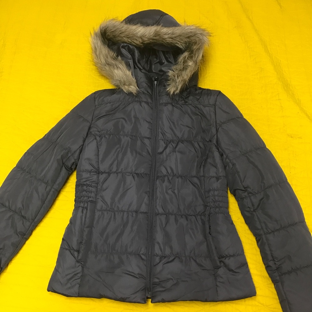 Gray puffer jacket.